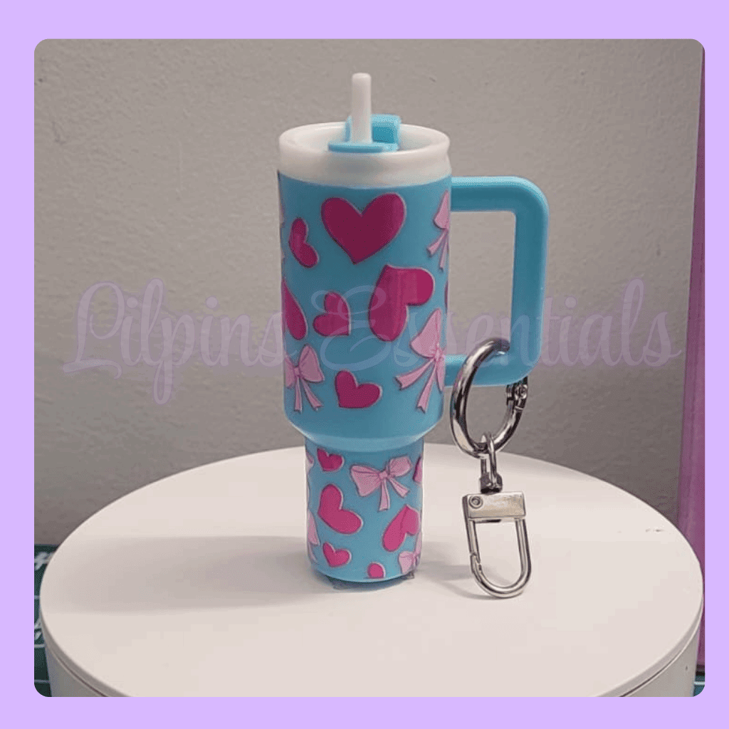 Blue mini tumbler keychain with pink hearts and bows