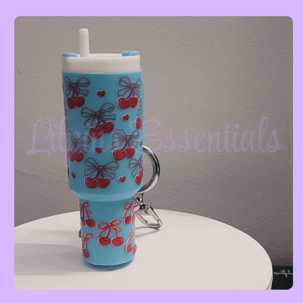Blue mini tumbler keychain with cherry and bow design