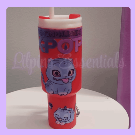 Red mini tumbler keychain with colourful character design