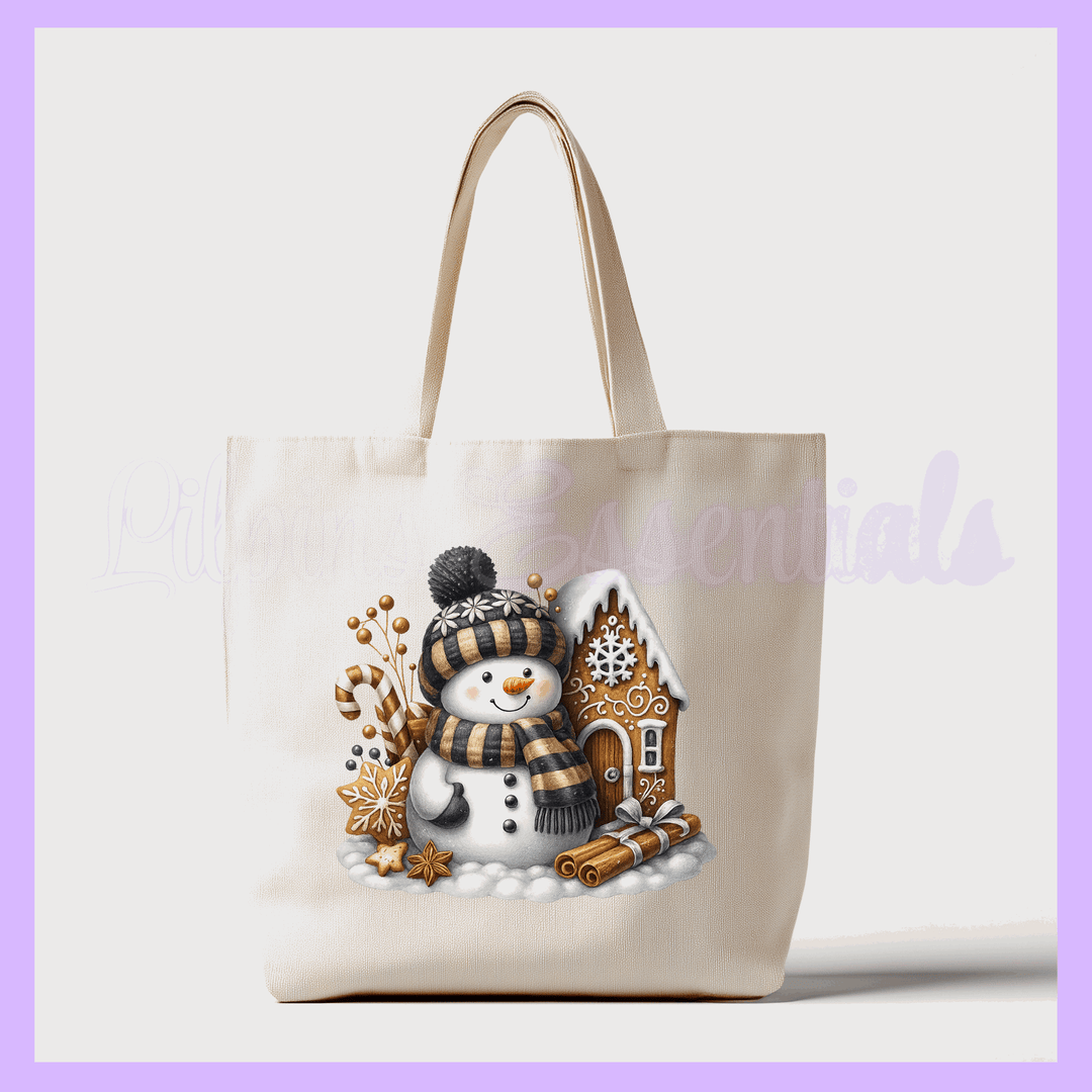 Tote bag with a snowman and gingerbread house design 