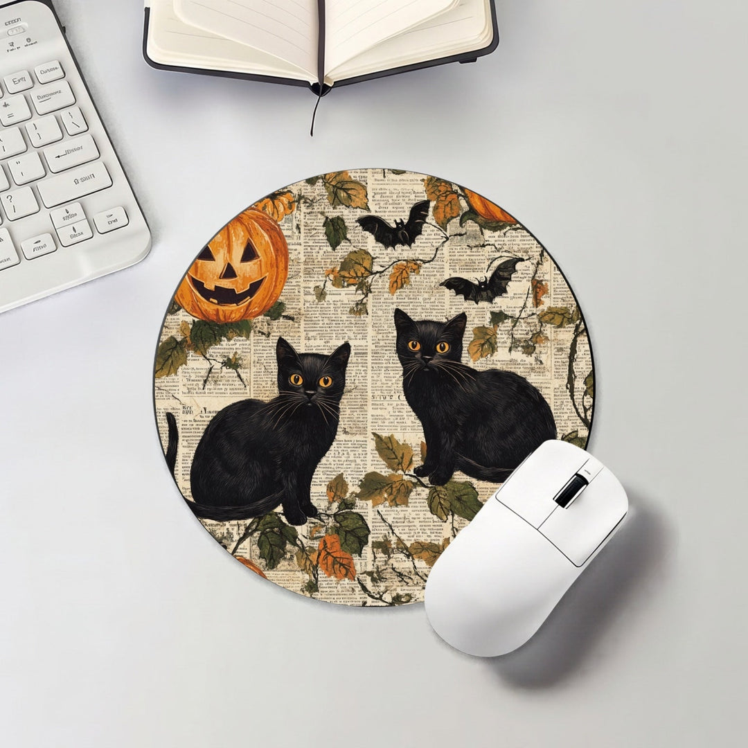 Halloween round mouse pad with black cats, pumpkins and autumn leaves
