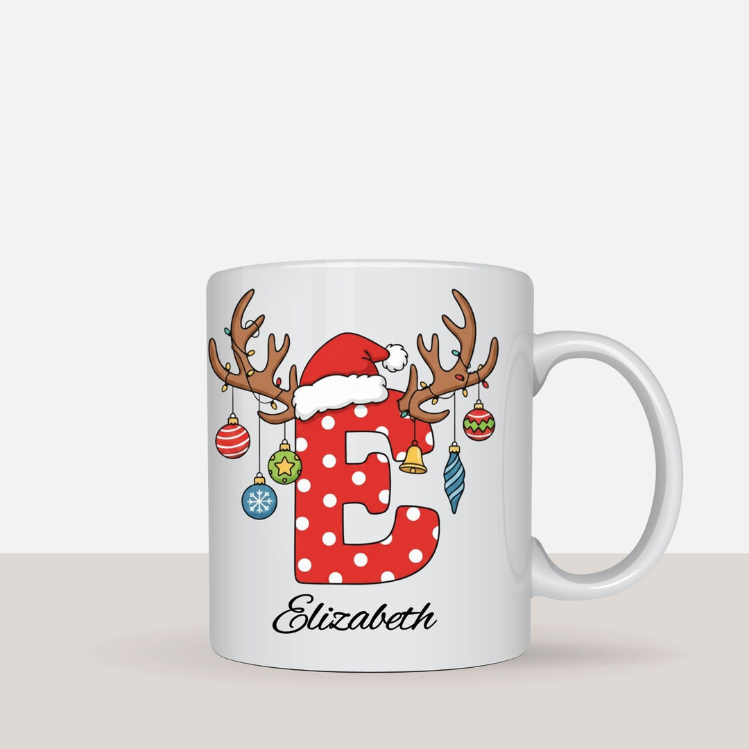 Personalised Christmas mugs with different initials and names displayed together