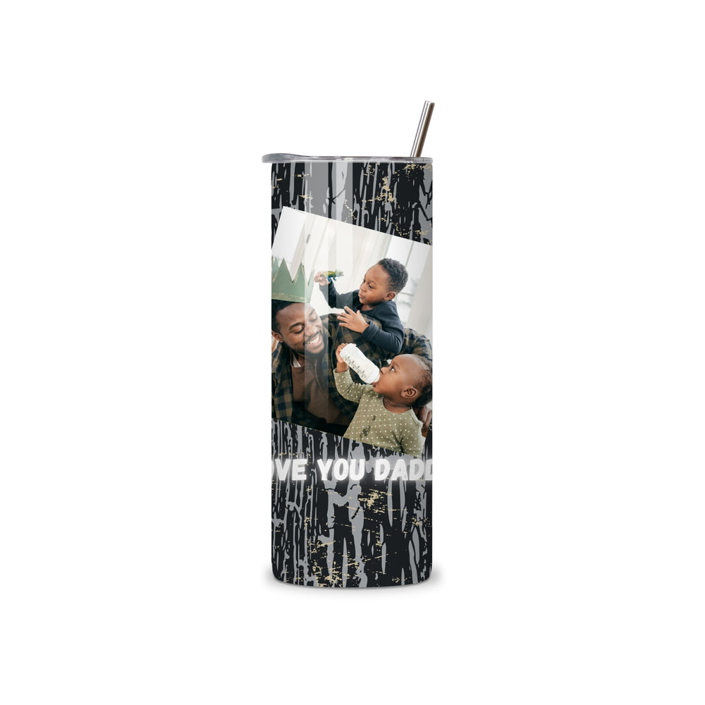 A tall, slim stainless steel tumbler with a custom photo print of a father and children, featuring a black and white dripping paint design and the text 'I LOVE YOU DAD'. A clear lid with a dark straw is on top, shown against a plain white background.