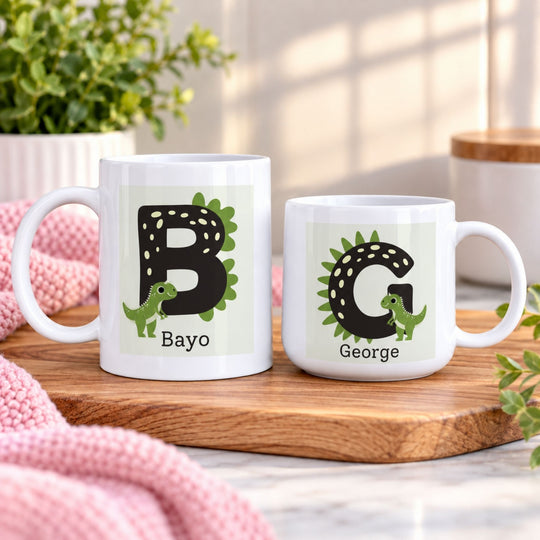 Personalised kids dinosaur initial mug with spotted letter and green spikes