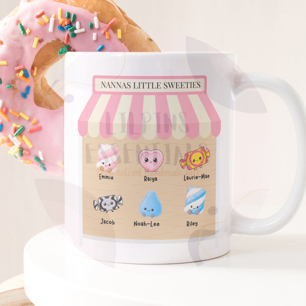Personalised Nanna's Little Sweeties mug with six names in pink sweet shop design