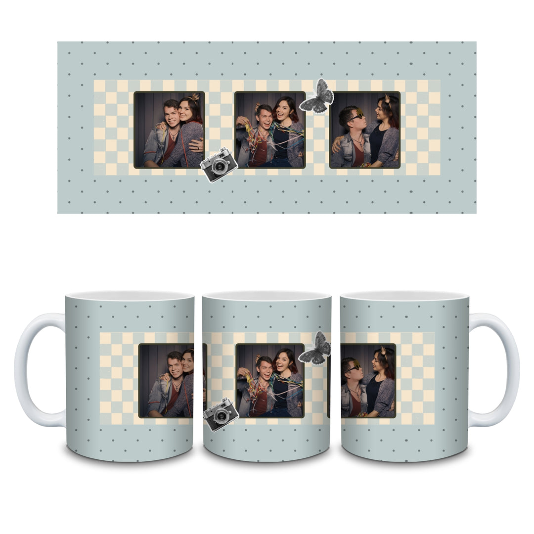 Personalised photo booth mug full wrap showing three photo strip, dusty-blue checkerboard, camera and butterfly details