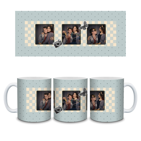 Personalised photo booth mug full wrap showing three photo strip, dusty-blue checkerboard, camera and butterfly details